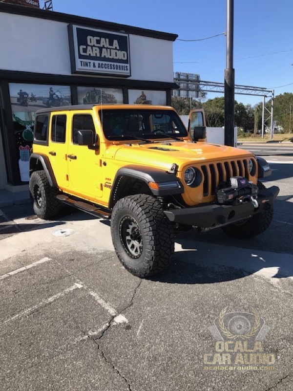 Jeep Wrangler sitting in front of Ocala Car Audio